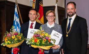 OB Eschenbacher honors Youssef Belkhadir (left) and Corinna Dawid Photo City of Freising